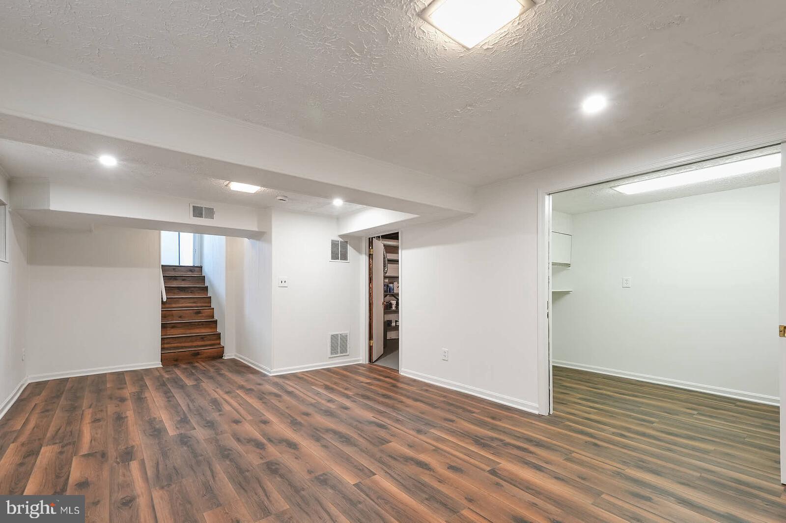 12517 Kuhl Road Silver Spring, MD 20902 - Photo 38 of 55 Recreation room toward stairs