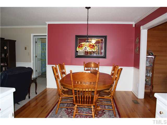 7460 Brogden Road Smithfield, NC 27577 - Photo 4 of 12 DINING ROOM WITH BEAUTIFUL HARDWOOD FLOORS