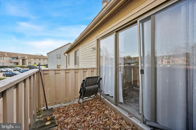 a view of balcony with furniture