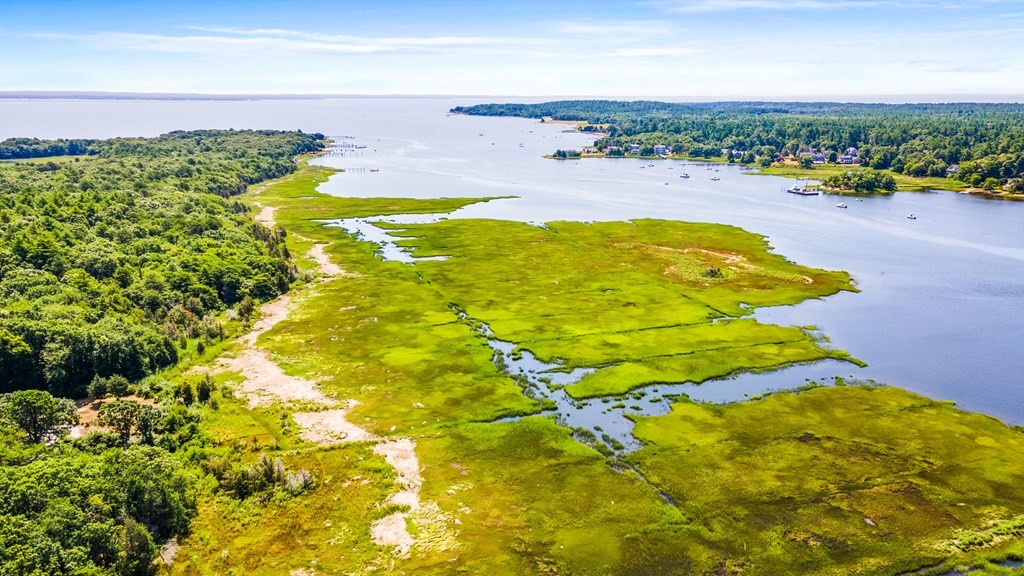 0 Cromesett Road Wareham, MA 02571 - Photo 2 of 9 a view of an outdoor space and swimming pool