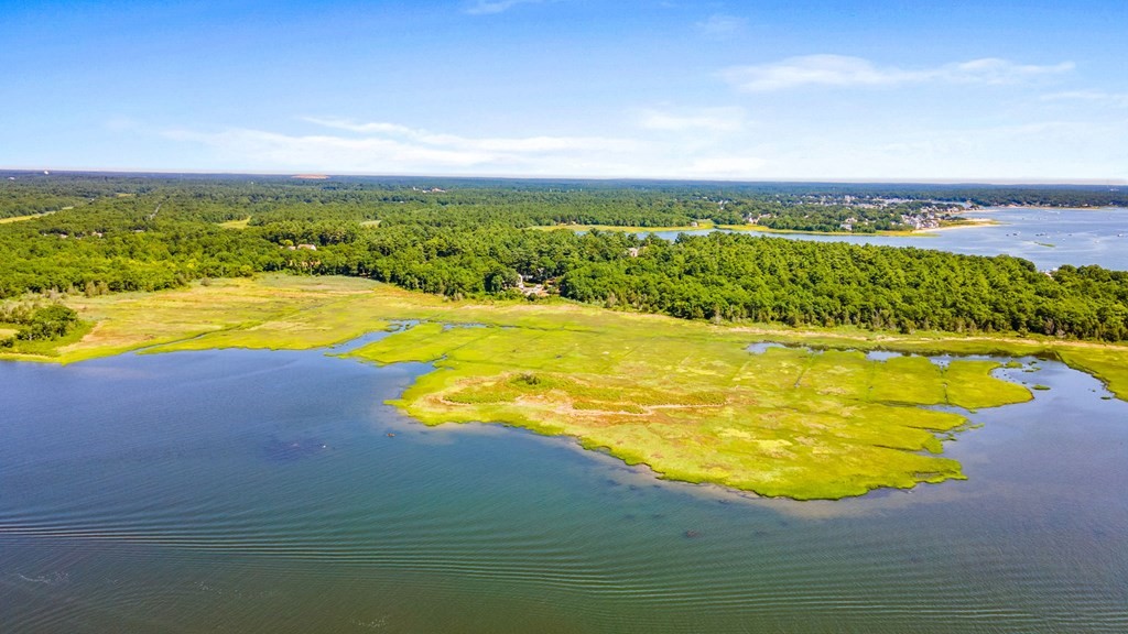 0 Cromesett Road Wareham, MA 02571 - Photo 7 of 9 a view of an swimming pool with an ocean view