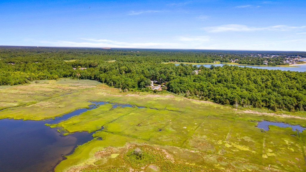 0 Cromesett Road Wareham, MA 02571 - Photo 8 of 9 a view of an ocean from a yard