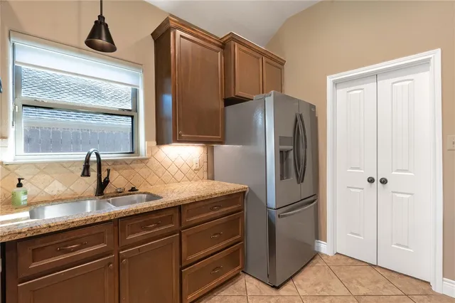 a view of staircase with wooden floor and white walls