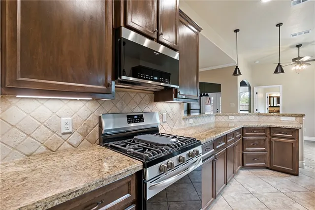 a bedroom with a bed and a dresser in it