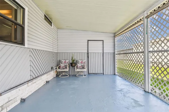 a view of a cars park in front of a house