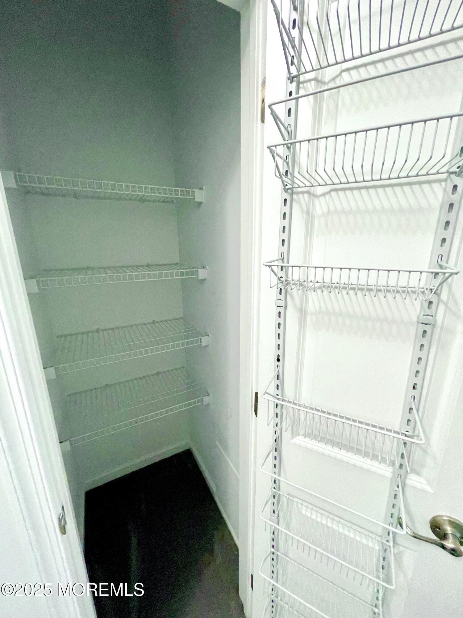 46 Michael Drive Tinton Falls, NJ 07712 - Photo 12 of 16 a bathroom with a glass shower door