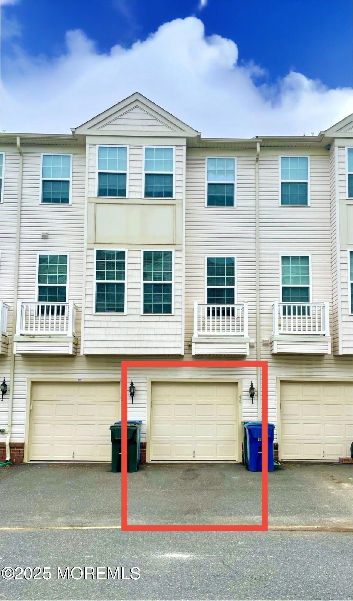 46 Michael Drive Tinton Falls, NJ 07712 - Photo 2 of 16 a front view of a house with street
