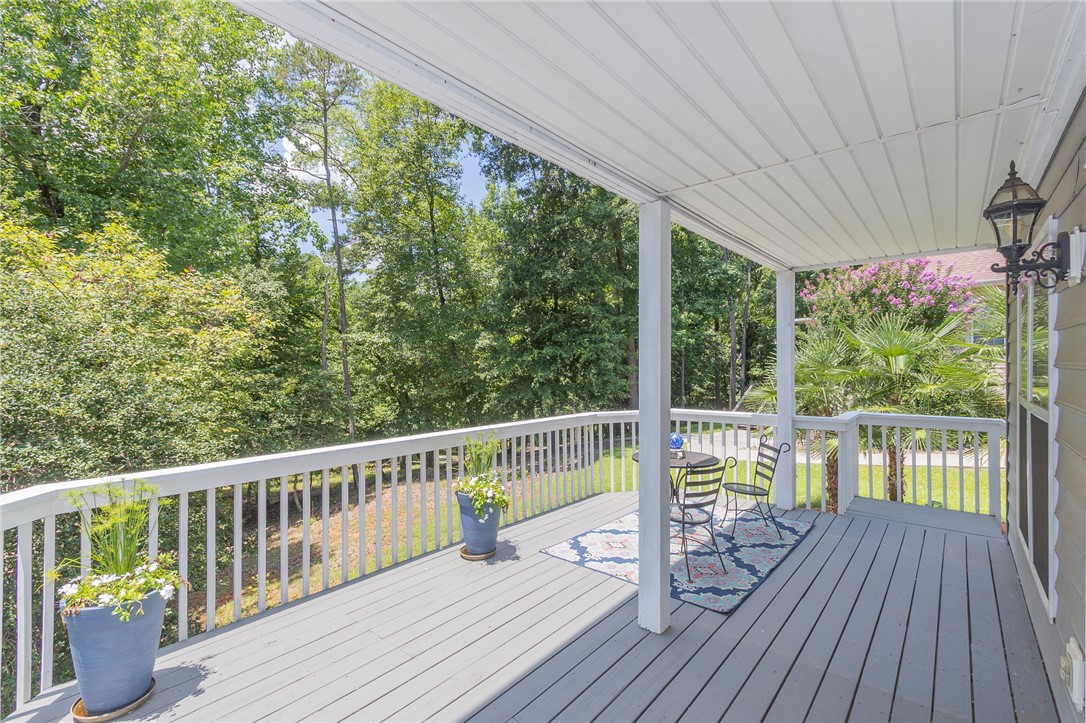 125 Inlet Pointe Drive Anderson, SC 29625 - Photo 15 of 39 Enjoy tranquil woodland vistas from this inviting covered patio.