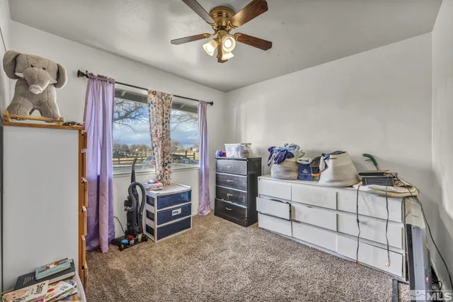 a workspace with furniture and window