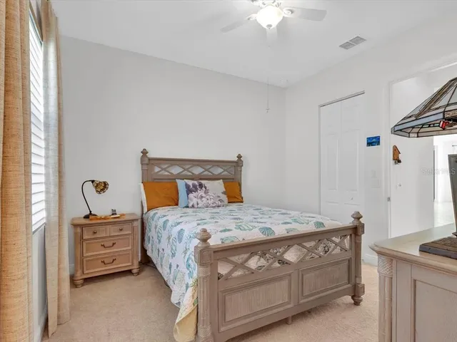 a kitchen with kitchen island granite countertop wooden cabinets a center island stainless steel appliances and a center island