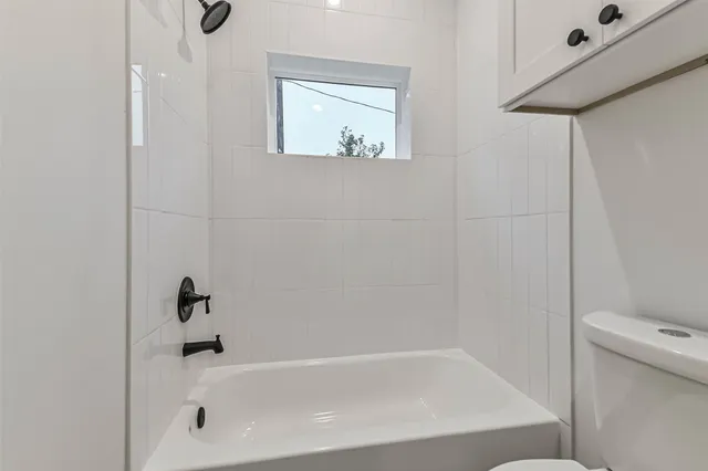 an empty room with wooden floor