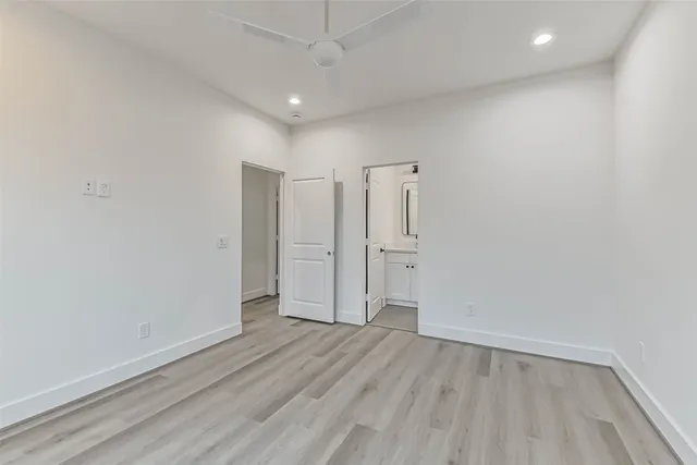a white bath tub sitting in a bathroom