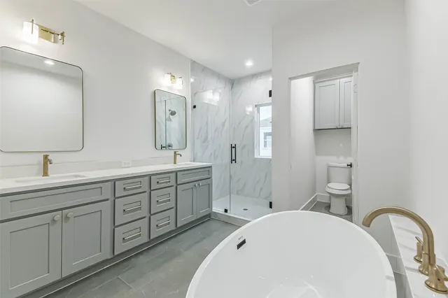 an aerial view of a house with a yard and plants