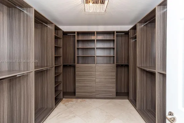 a bathroom with a sink double vanity and a mirror