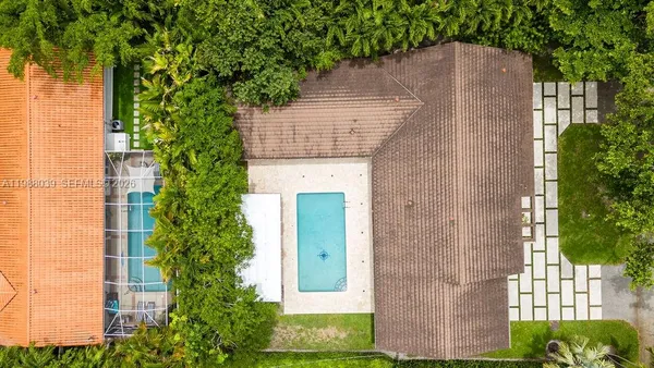 view of a house with a yard