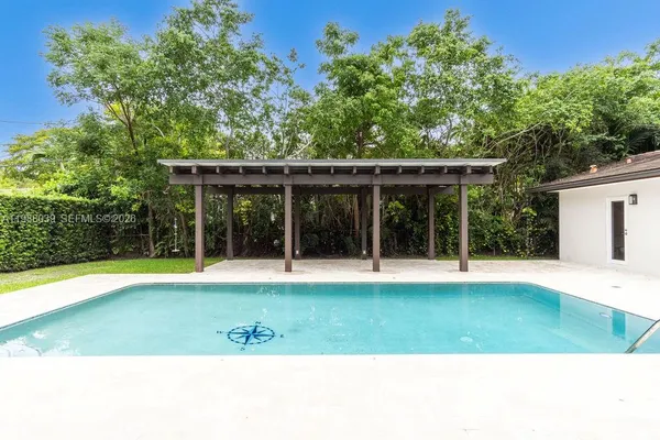 a view of a backyard of a house