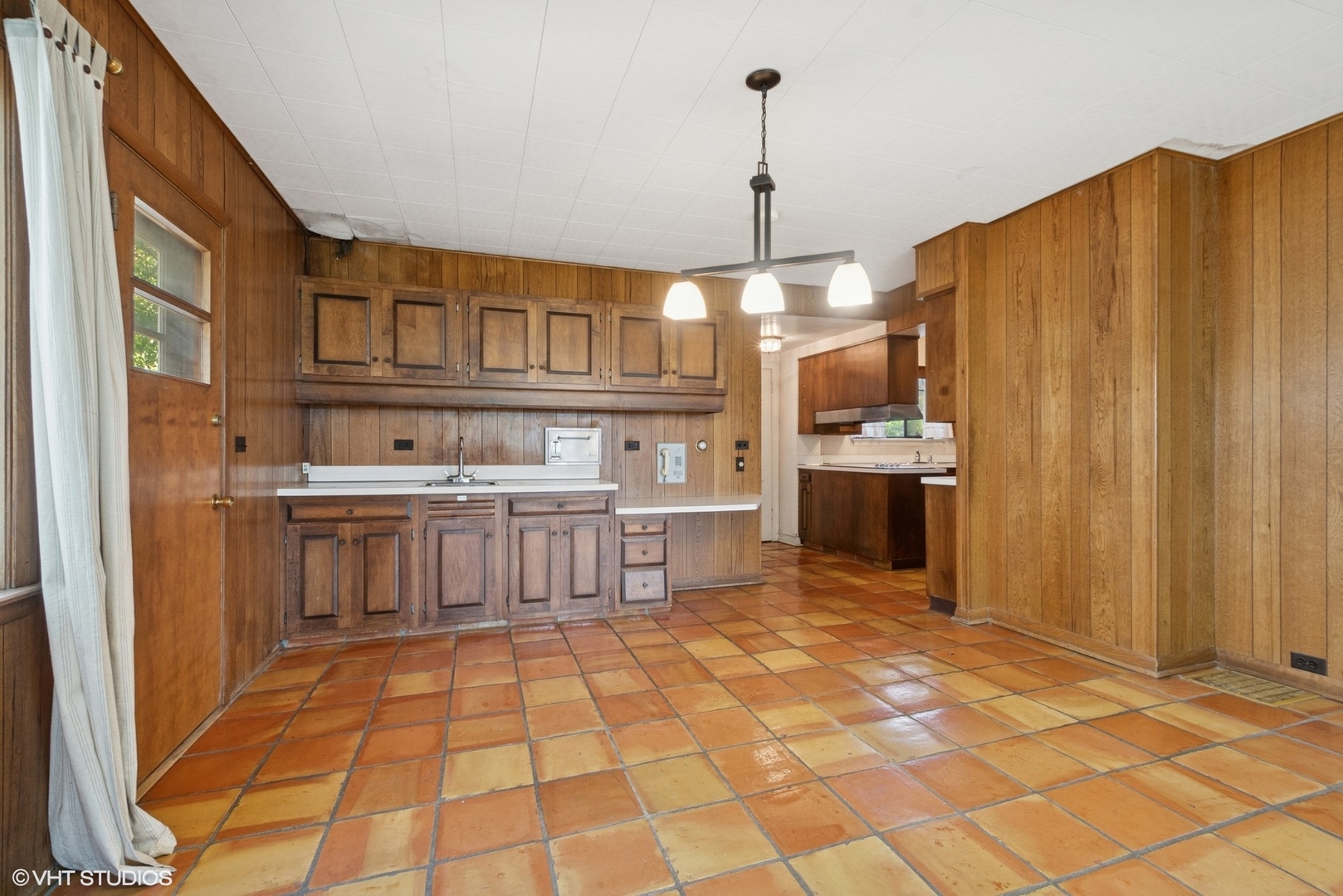 1288 Sunview Lane Winnetka, IL 60093 - Photo 11 of 25 a kitchen with stainless steel appliances granite countertop a stove a sink dishwasher and a refrigerator with wooden floor