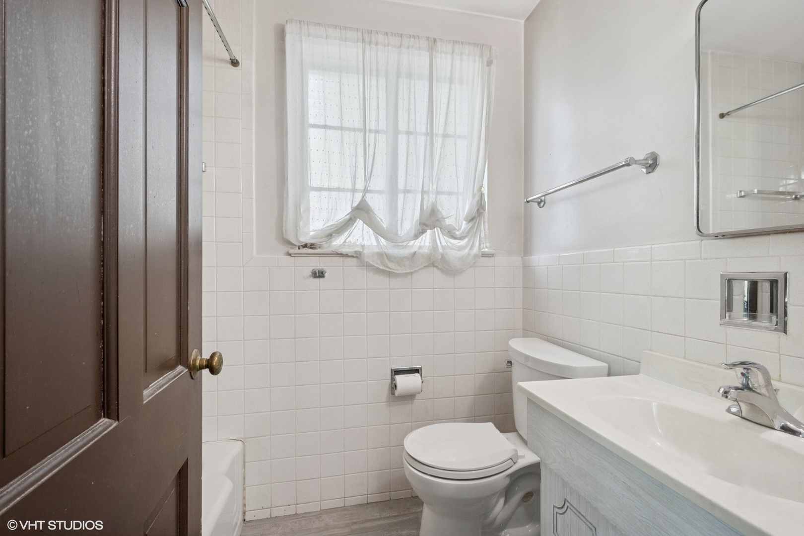 1288 Sunview Lane Winnetka, IL 60093 - Photo 13 of 25 a bathroom with a sink a toilet and shower