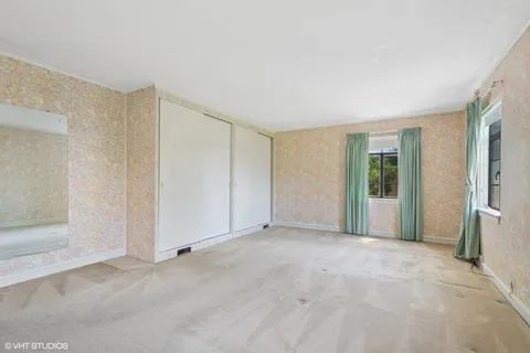 an empty room with window