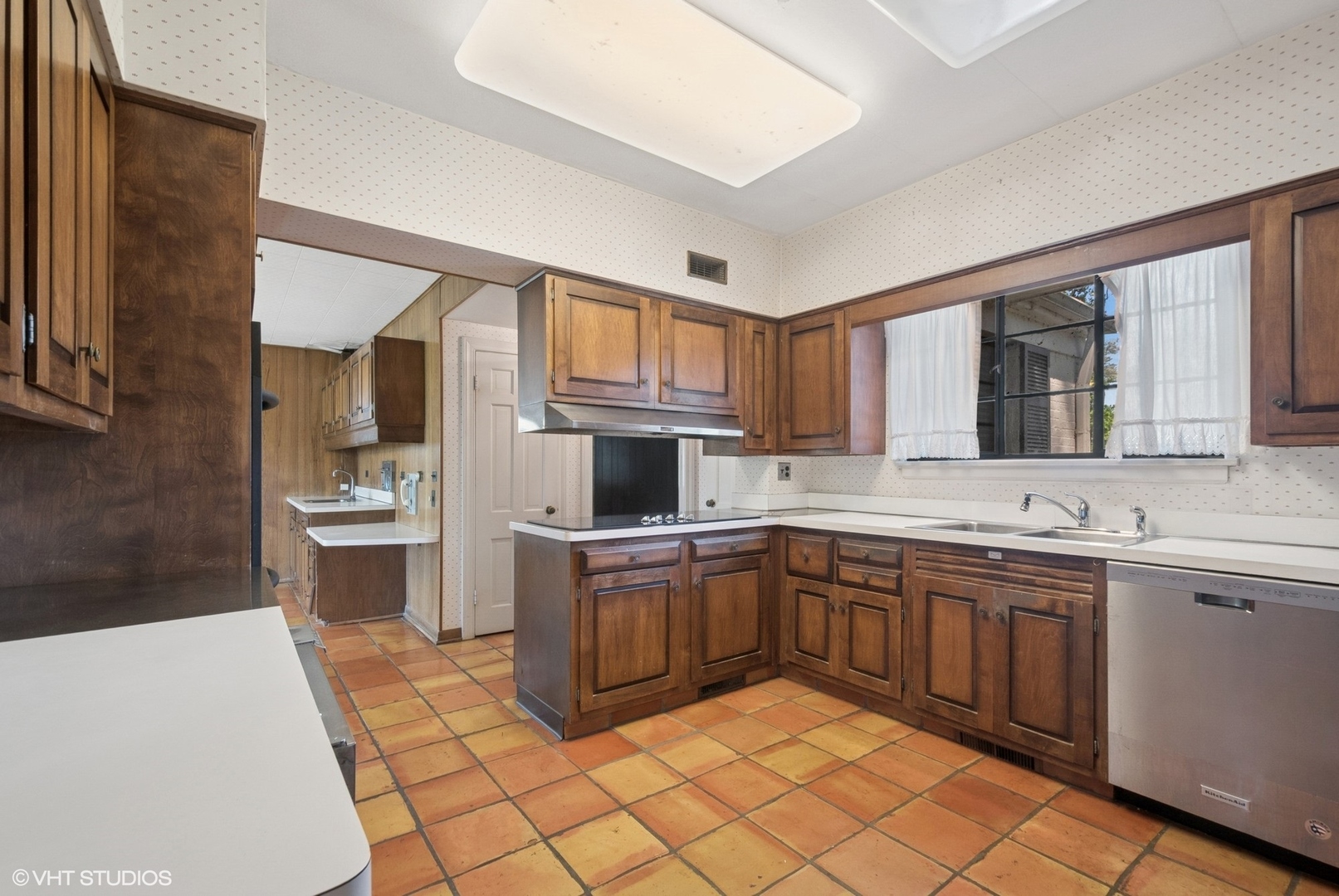 1288 Sunview Lane Winnetka, IL 60093 - Photo 6 of 25 a kitchen with a sink and cabinets