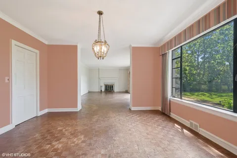 a view of empty room with windows