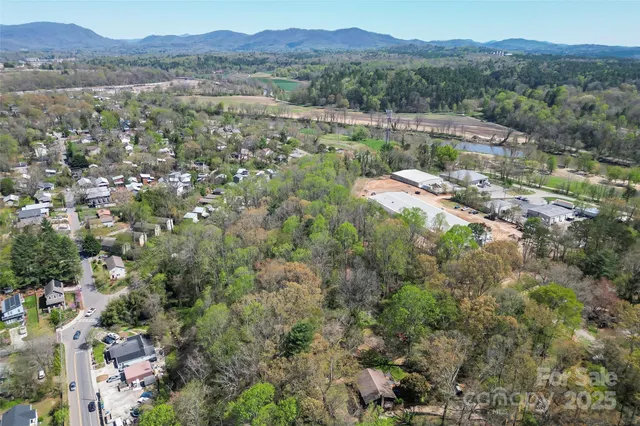 an aerial view of residential house with outdoor space