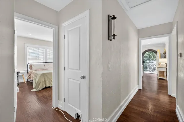 a view of walk in closet with living room