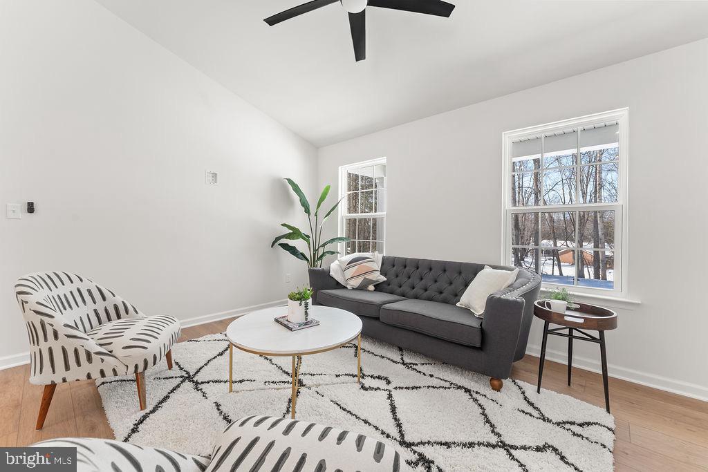 18289 Cameron Road Gordonsville, VA 22942 - Photo 11 of 71 a living room with furniture and wooden floor