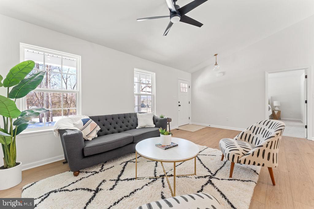 18289 Cameron Road Gordonsville, VA 22942 - Photo 13 of 71 a living room with furniture and a wooden floor