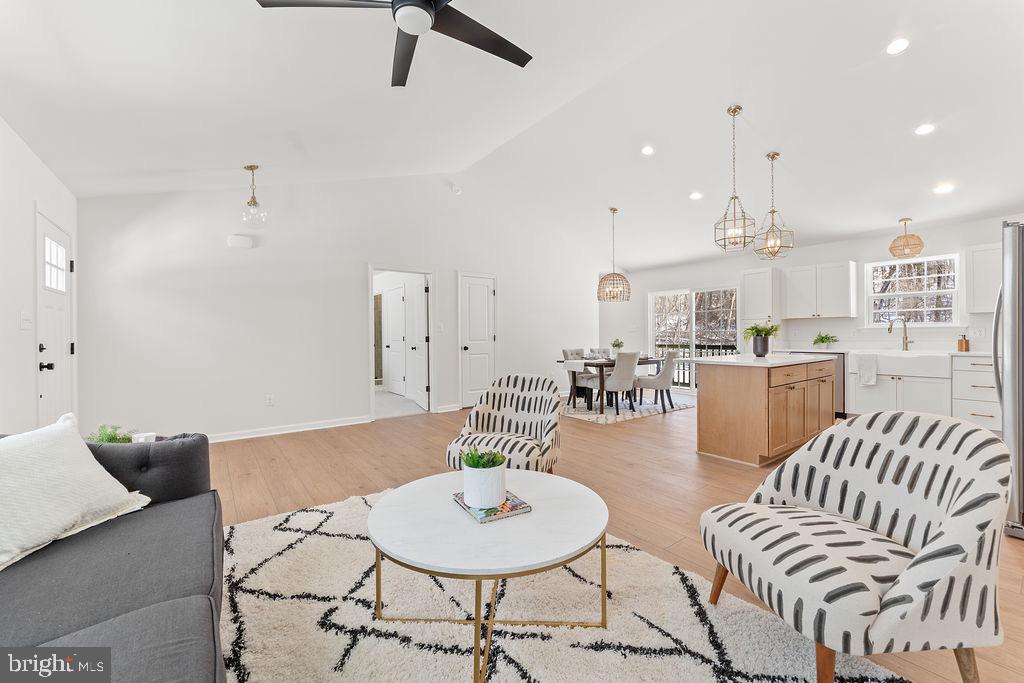 18289 Cameron Road Gordonsville, VA 22942 - Photo 14 of 71 a living room with furniture and a dining table