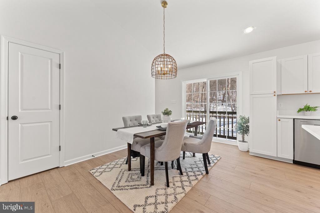 18289 Cameron Road Gordonsville, VA 22942 - Photo 15 of 71 a view of a dining room with furniture window and wooden floor