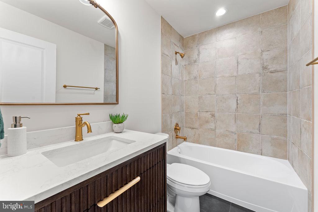 18289 Cameron Road Gordonsville, VA 22942 - Photo 31 of 71 a bathroom with a sink a toilet and shower