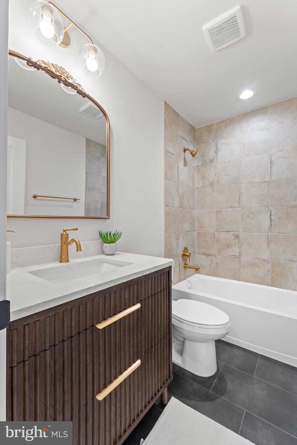 18289 Cameron Road Gordonsville, VA 22942 - Photo 33 of 71 a bathroom with a sink a toilet and a bathtub