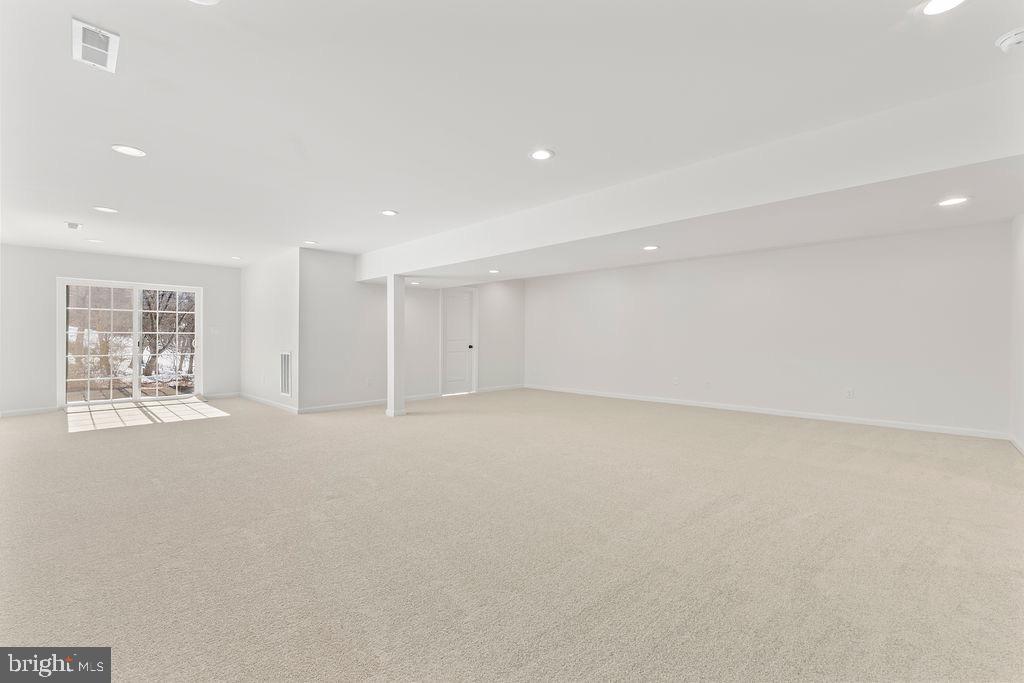 18289 Cameron Road Gordonsville, VA 22942 - Photo 35 of 71 a view of an empty room with wooden floor and a window