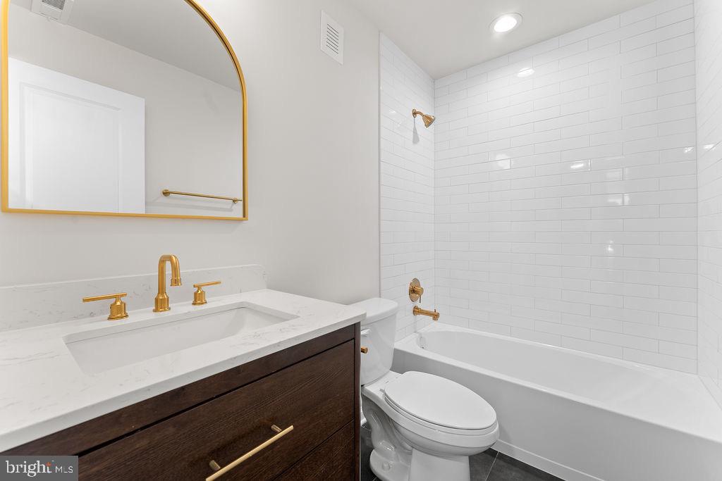 18289 Cameron Road Gordonsville, VA 22942 - Photo 42 of 71 a bathroom with a sink a toilet and a bathtub