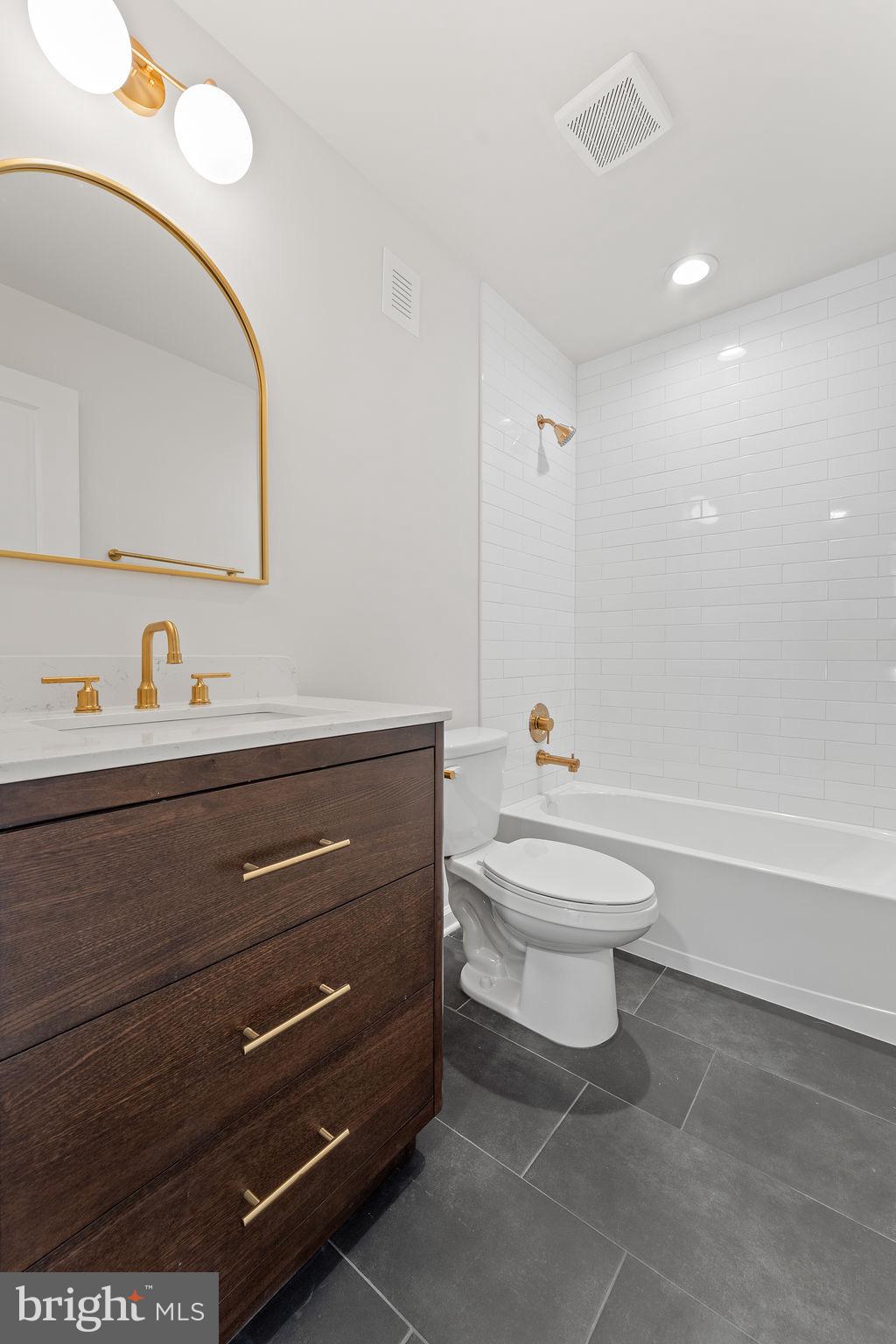 18289 Cameron Road Gordonsville, VA 22942 - Photo 44 of 71 a bathroom with a toilet a sink and a mirror