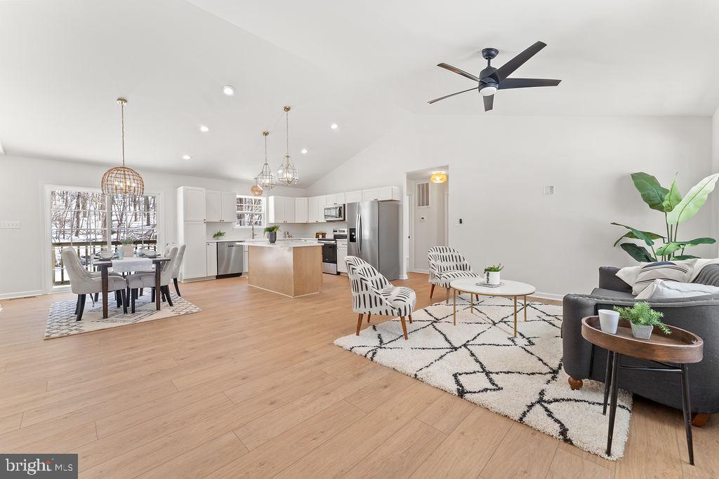 18289 Cameron Road Gordonsville, VA 22942 - Photo 5 of 71 a living room with lots of furniture and a chandelier