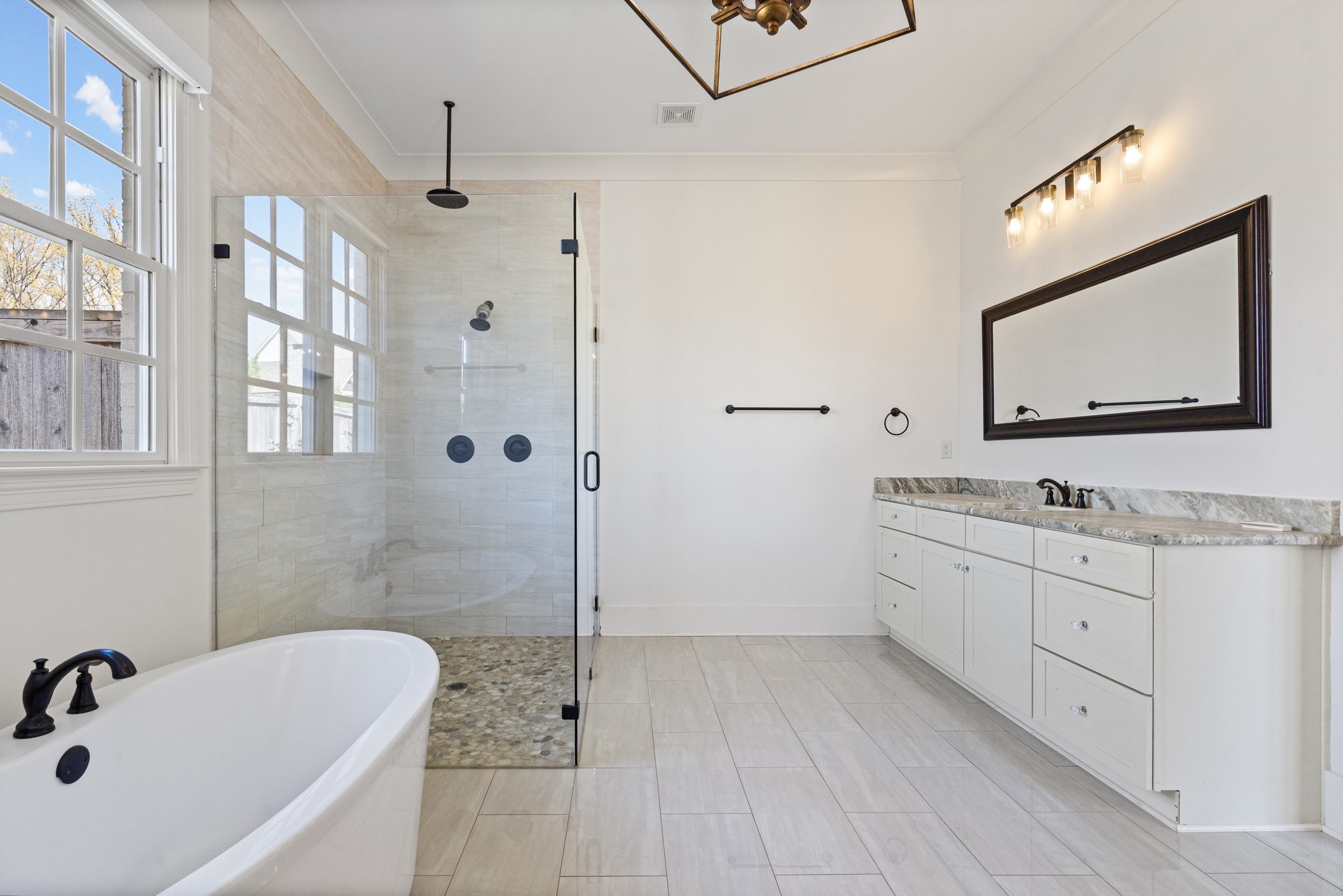 12608 Bravo Road Collierville, TN 38017 - Photo 40 of 40 Full bath with vanity, a freestanding bath, a stall shower, and crown molding