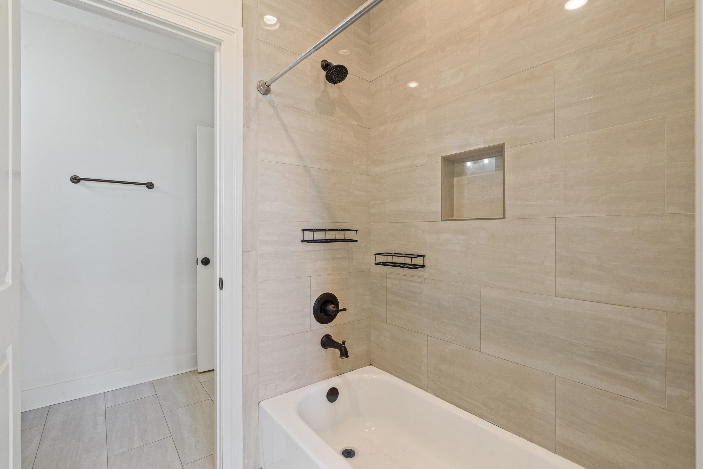 12608 Bravo Road Collierville, TN 38017 - Photo 28 of 40 Full bathroom with shower combination and light tile patterned floors