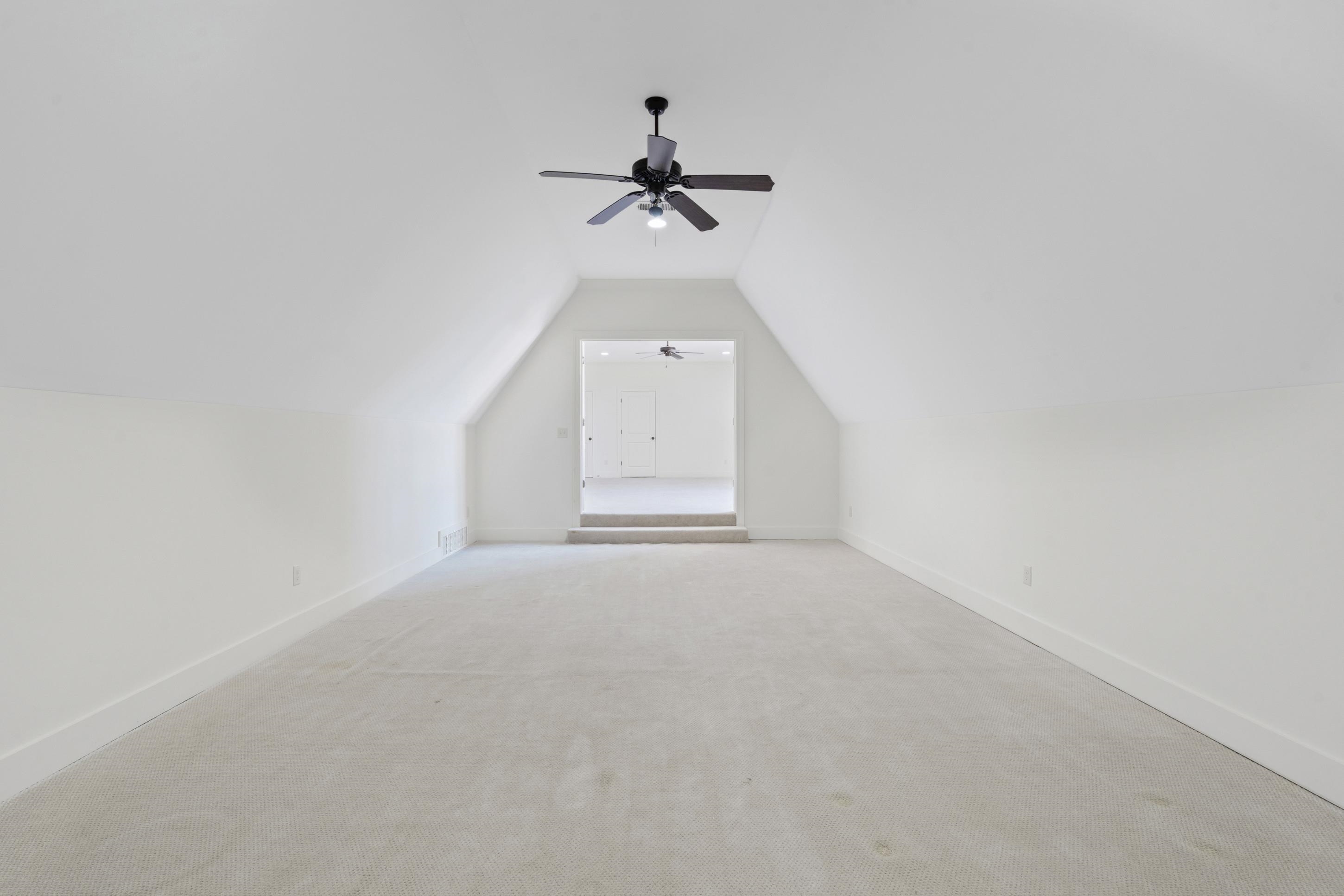 12608 Bravo Road Collierville, TN 38017 - Photo 35 of 40 Bonus room featuring carpet and a ceiling fan