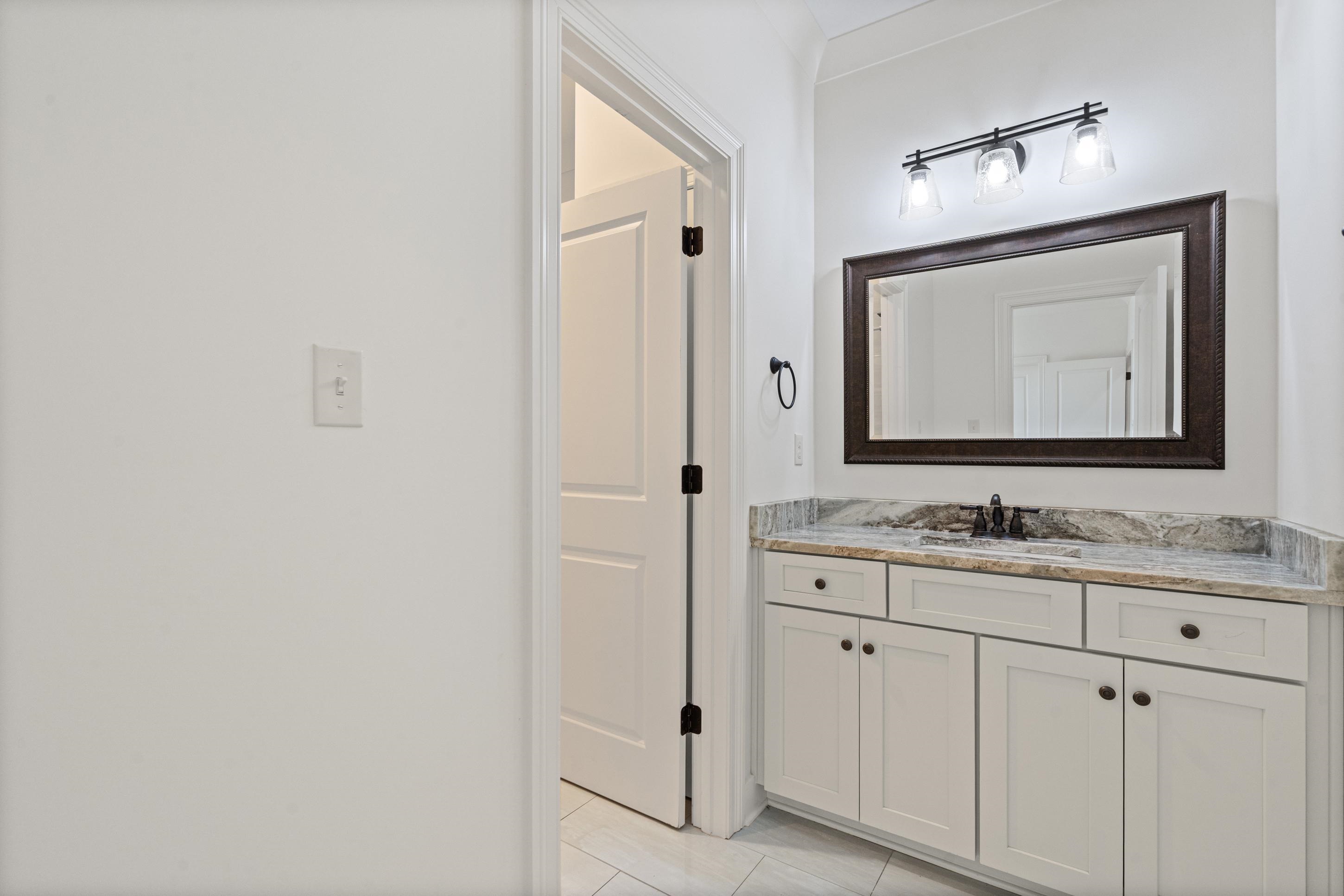12608 Bravo Road Collierville, TN 38017 - Photo 35 of 40 Bathroom with vanity and light tile patterned floors