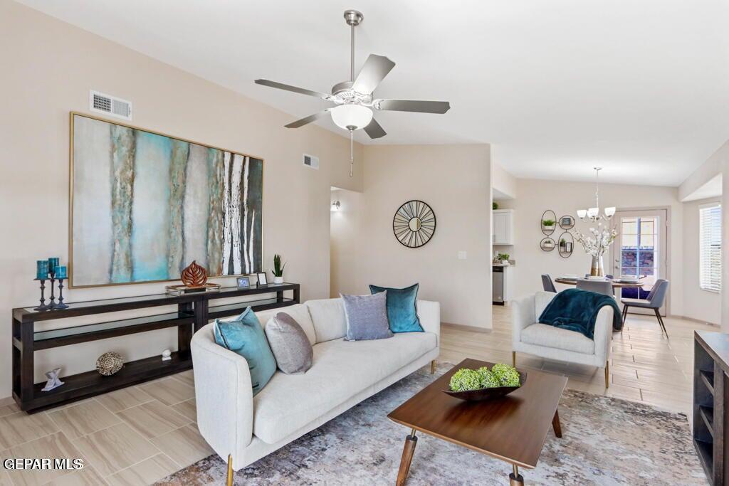 15040 Function Court El Paso, TX 79928 - Photo 2 of 10 a living room with furniture and a large window