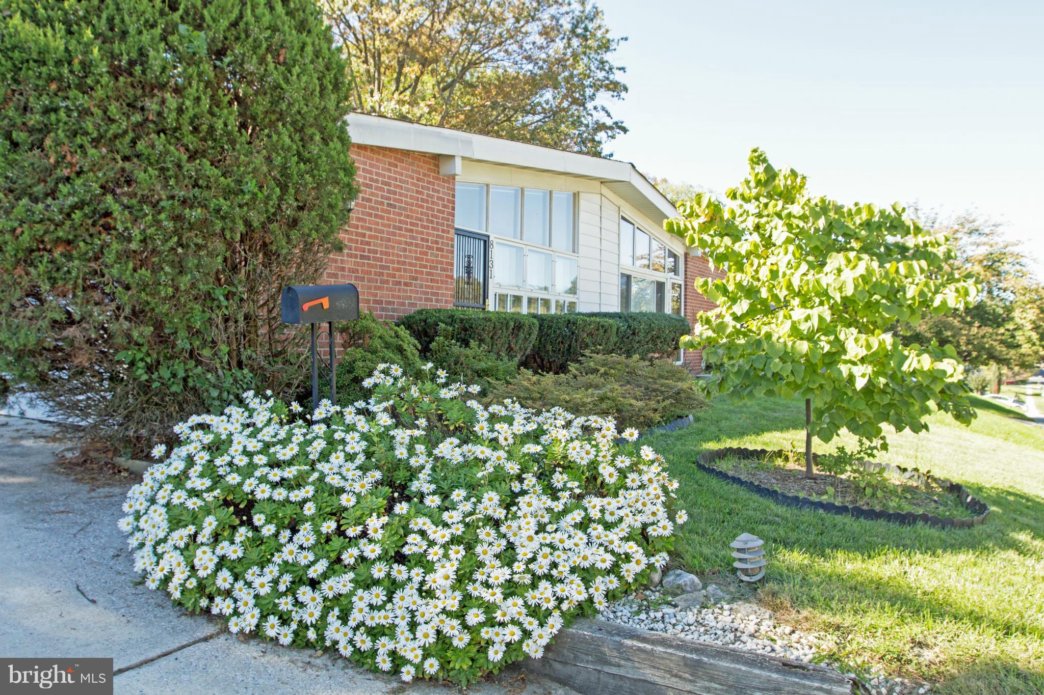 8131 Scotts Level Road Baltimore, MD 21208 - Photo 25 of 29 a house view with a garden space