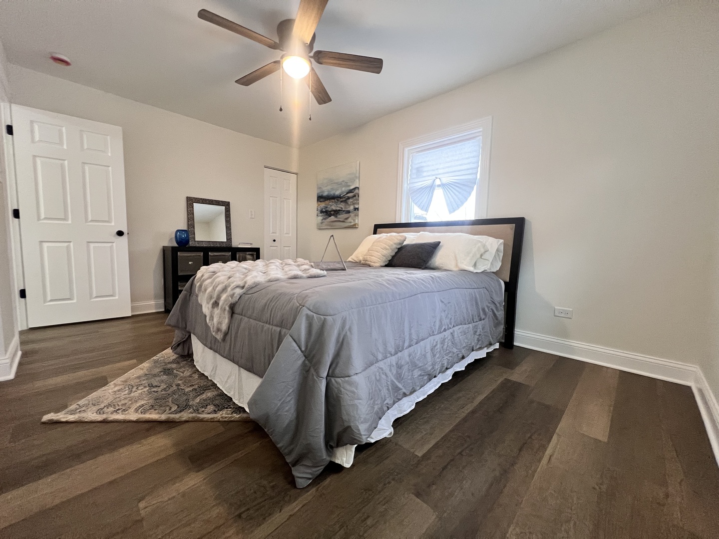 16607 Winchester Avenue Markham, IL 60428 - Photo 22 of 32 a bedroom with a bed and a chandelier