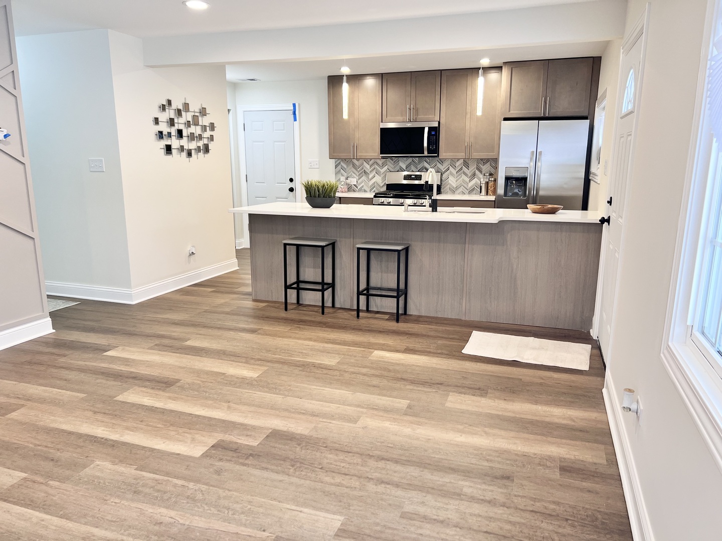 16607 Winchester Avenue Markham, IL 60428 - Photo 3 of 32 a kitchen with kitchen island a sink stainless steel appliances and cabinets