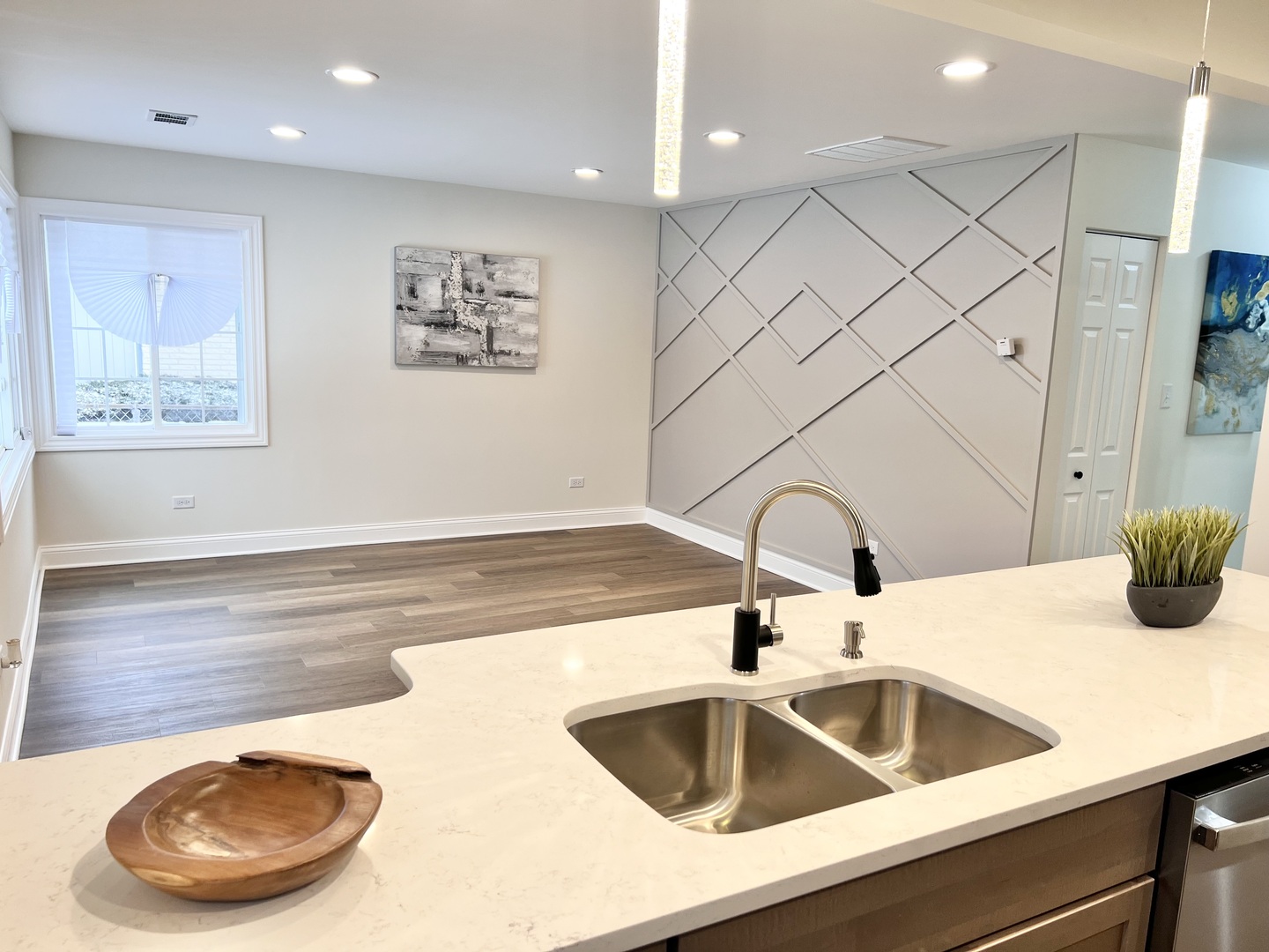 16607 Winchester Avenue Markham, IL 60428 - Photo 5 of 32 a kitchen with a sink and a stove with wooden floor