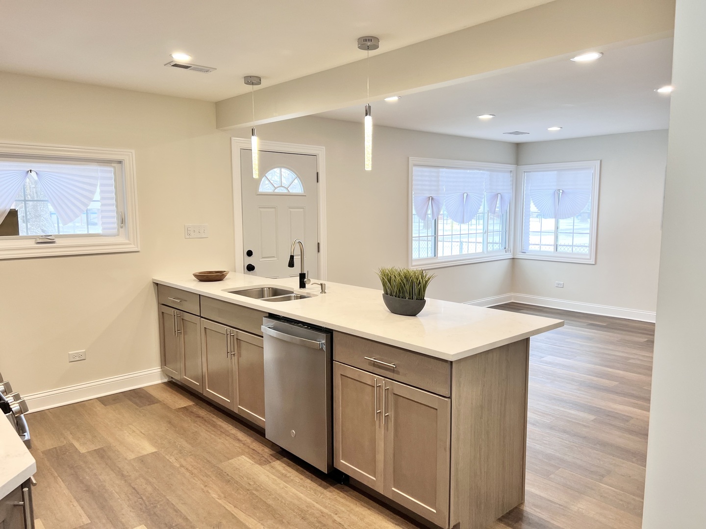 16607 Winchester Avenue Markham, IL 60428 - Photo 6 of 32 a kitchen with a sink and a stove top oven