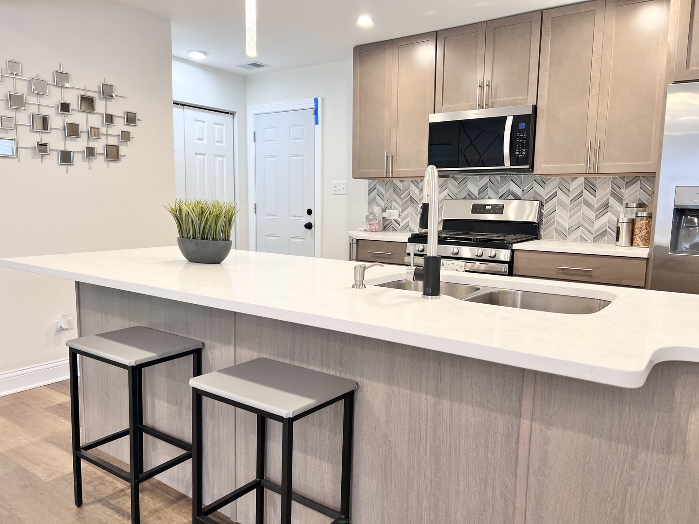 16607 Winchester Avenue Markham, IL 60428 - Photo 9 of 32 a kitchen with kitchen island a counter top space appliances and cabinets