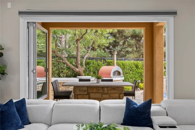 a kitchen with center island and windows