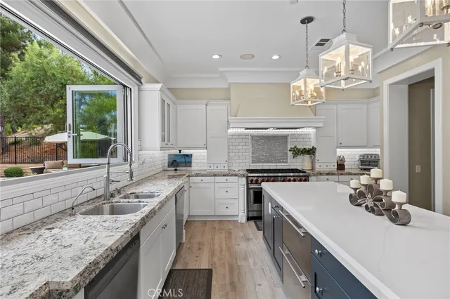 a bedroom with a bed couch and window